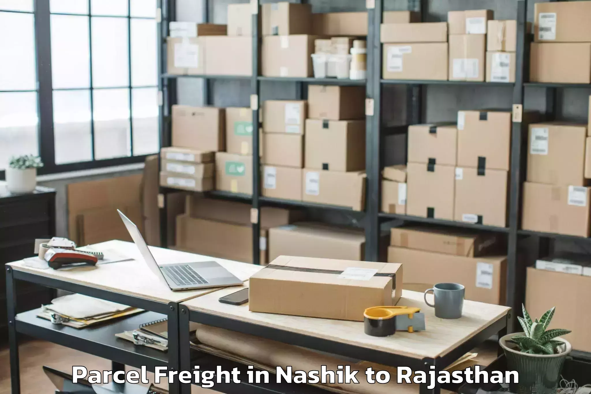 Reliable Nashik to Haridev Joshi University Of Jo Parcel Freight